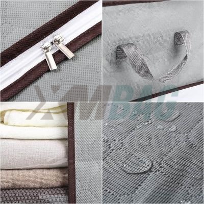 
     Bolsas de almacenamiento de ropa plegables repelentes al agua de tela no tejida
    